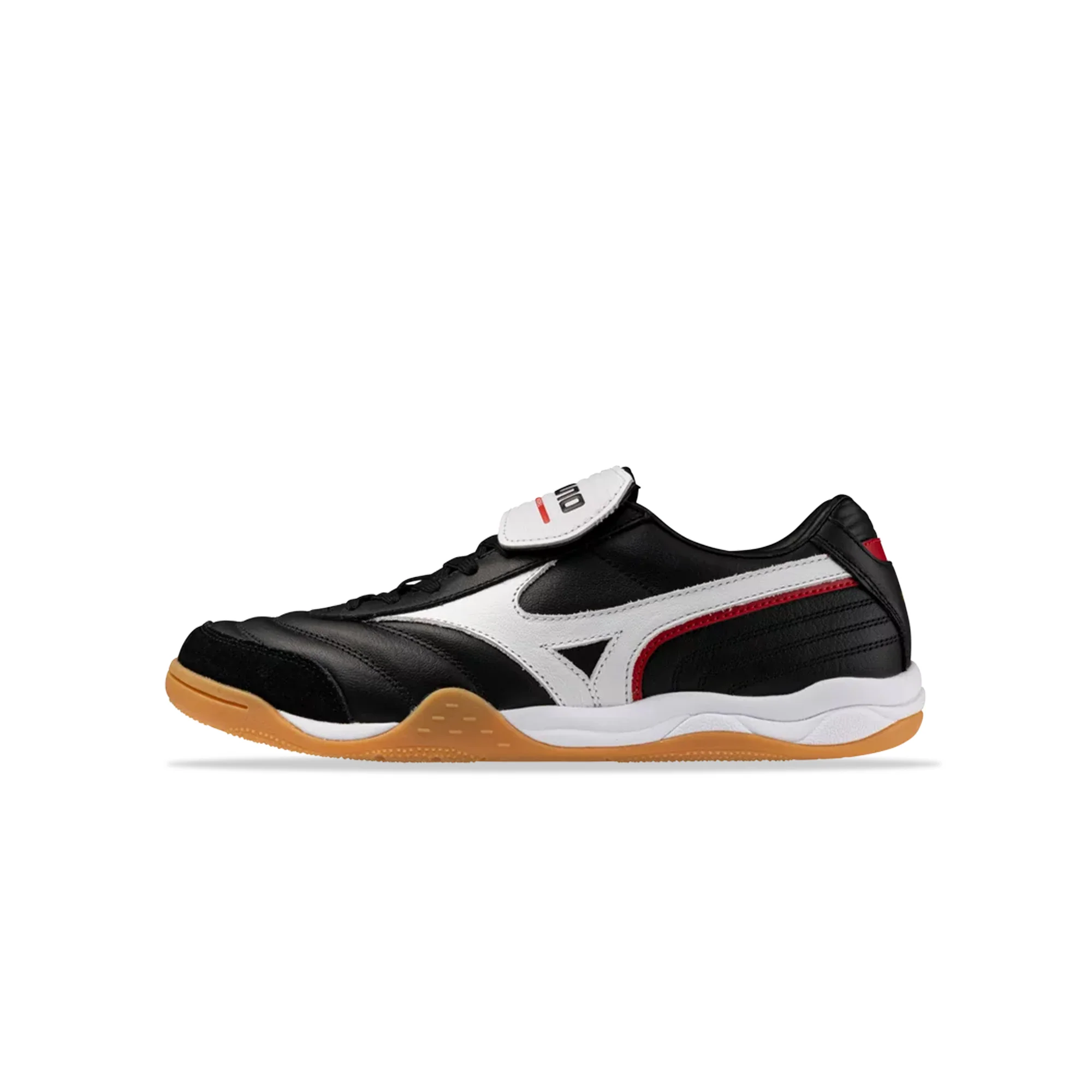 A Mizuno Morelia football boot in black and white with a gum sole