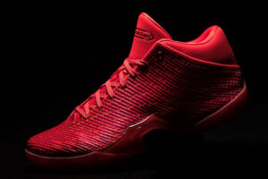 Air Jordan 41 Ruby lateral side view showing the tonal red nano print mesh upper