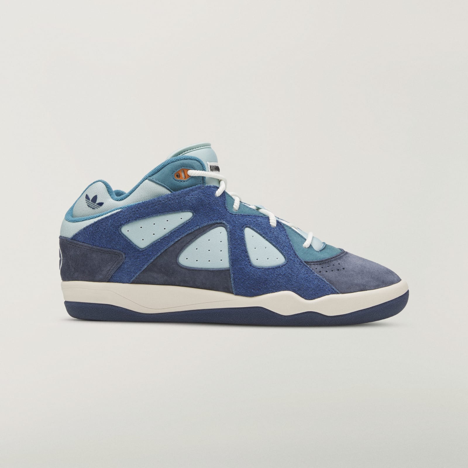 adidas BadBo 1.0 Night Navy lateral profile showing the navy and indigo suede panels