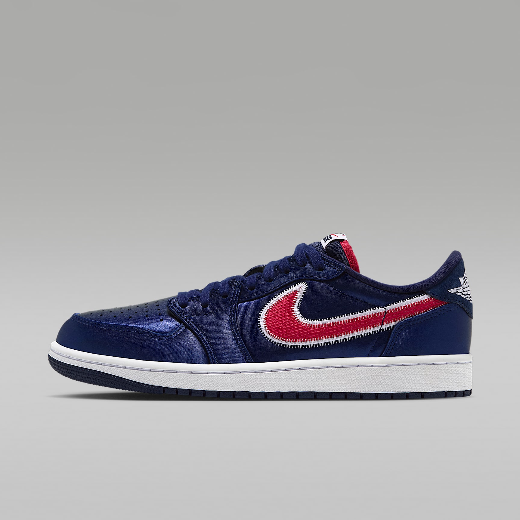 Air Jordan 1 Low OG Howard side profile in College Navy with University Red Swoosh