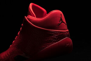 Heel of the Air Jordan 41 Ruby showing the Jumpman on the collar and XLI stamped into the midsole