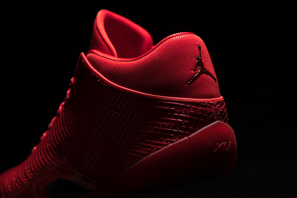Heel of the Air Jordan 41 Ruby showing the Jumpman on the collar and XLI stamped into the midsole