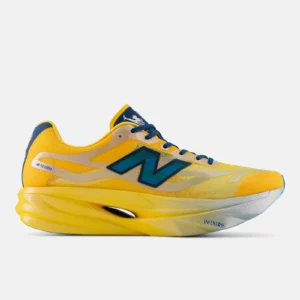 New Balance SuperComp Elite v6 TCS NYC Marathon in Satsuma Orange, lateral view of the translucent yellow mesh upper with a teal to blue N and yellow Infinion midsole