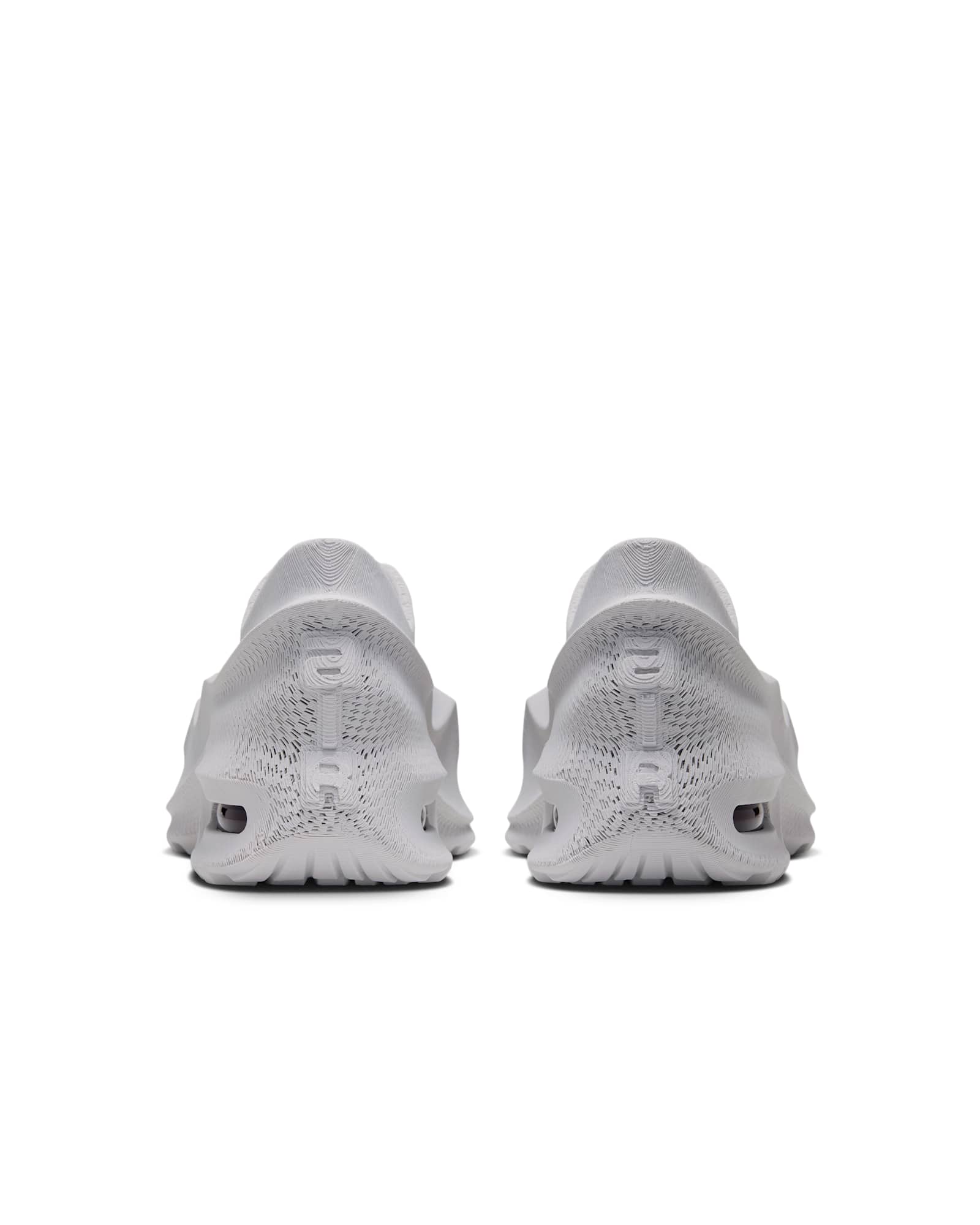 Nike Air Max 1000 heel view with AIR worked into the printed counter