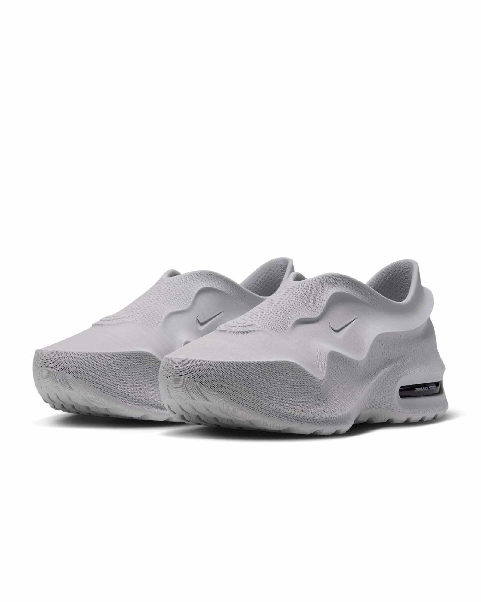 Nike Air Max 1000 pair in Stone shown at an angle