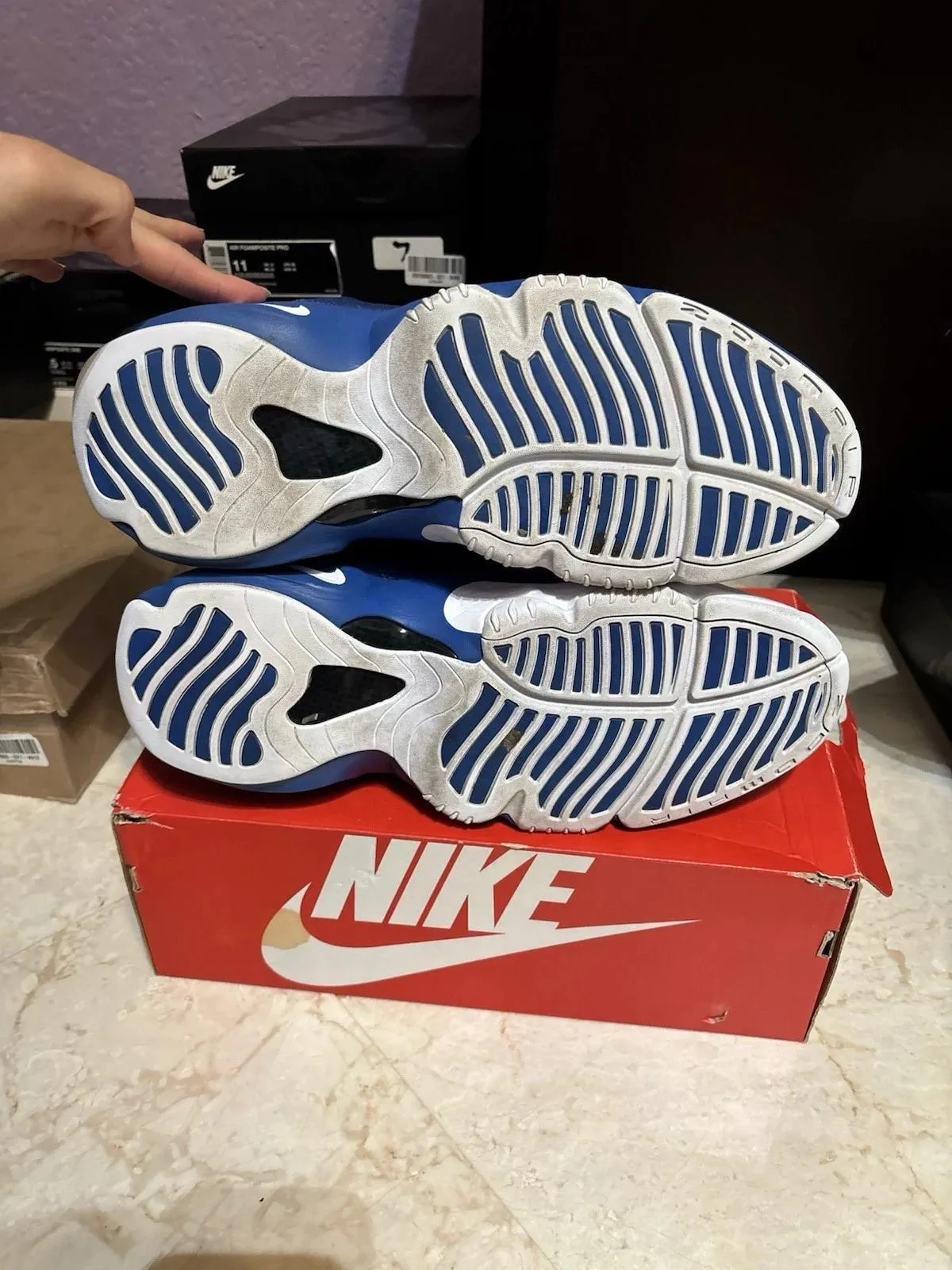 Outsoles of the Nike Air Zoom Flight The Glove in royal blue showing the blue traction pattern