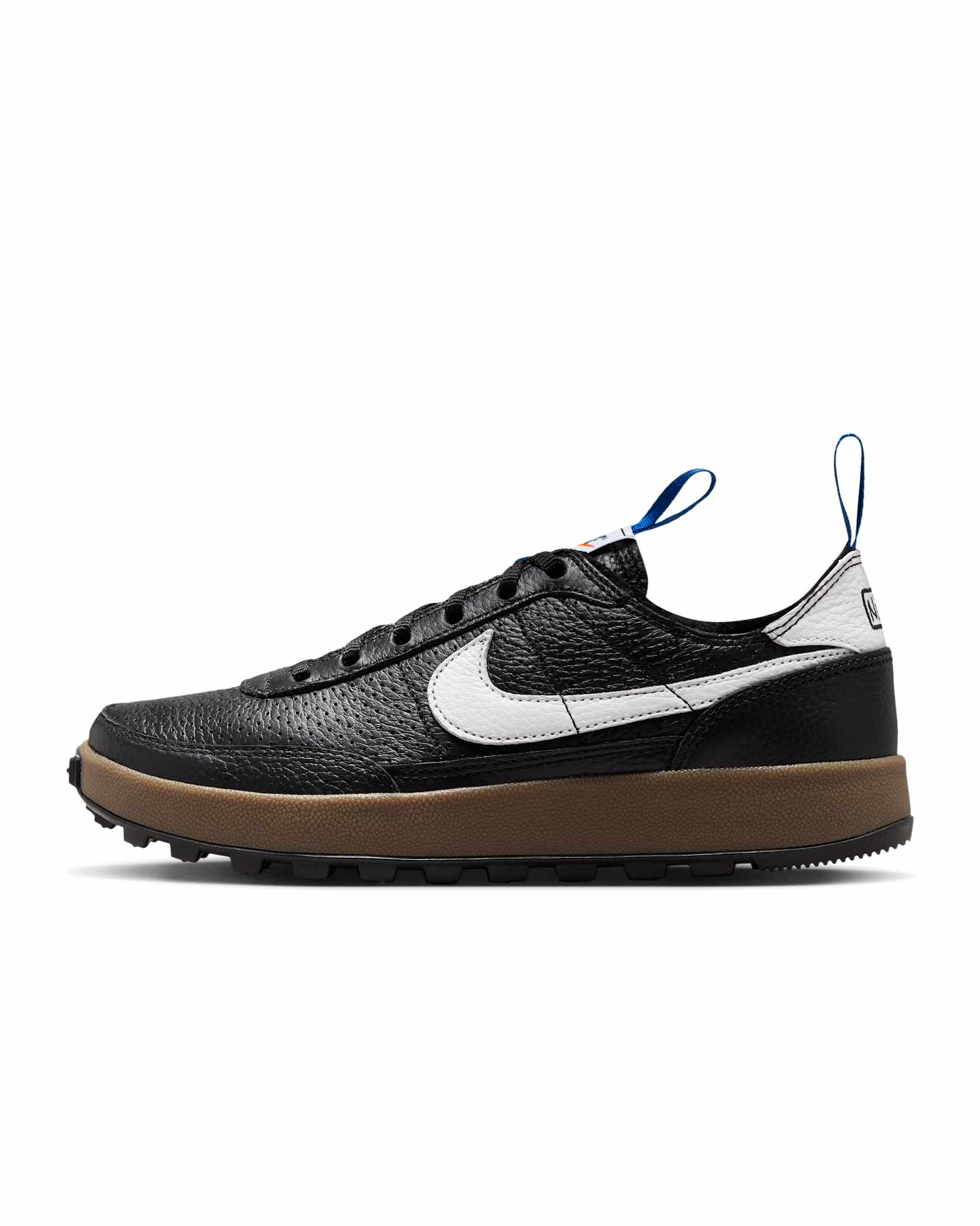 Nike General Purpose Shoe lateral profile in black leather with a white Swoosh and gum midsole