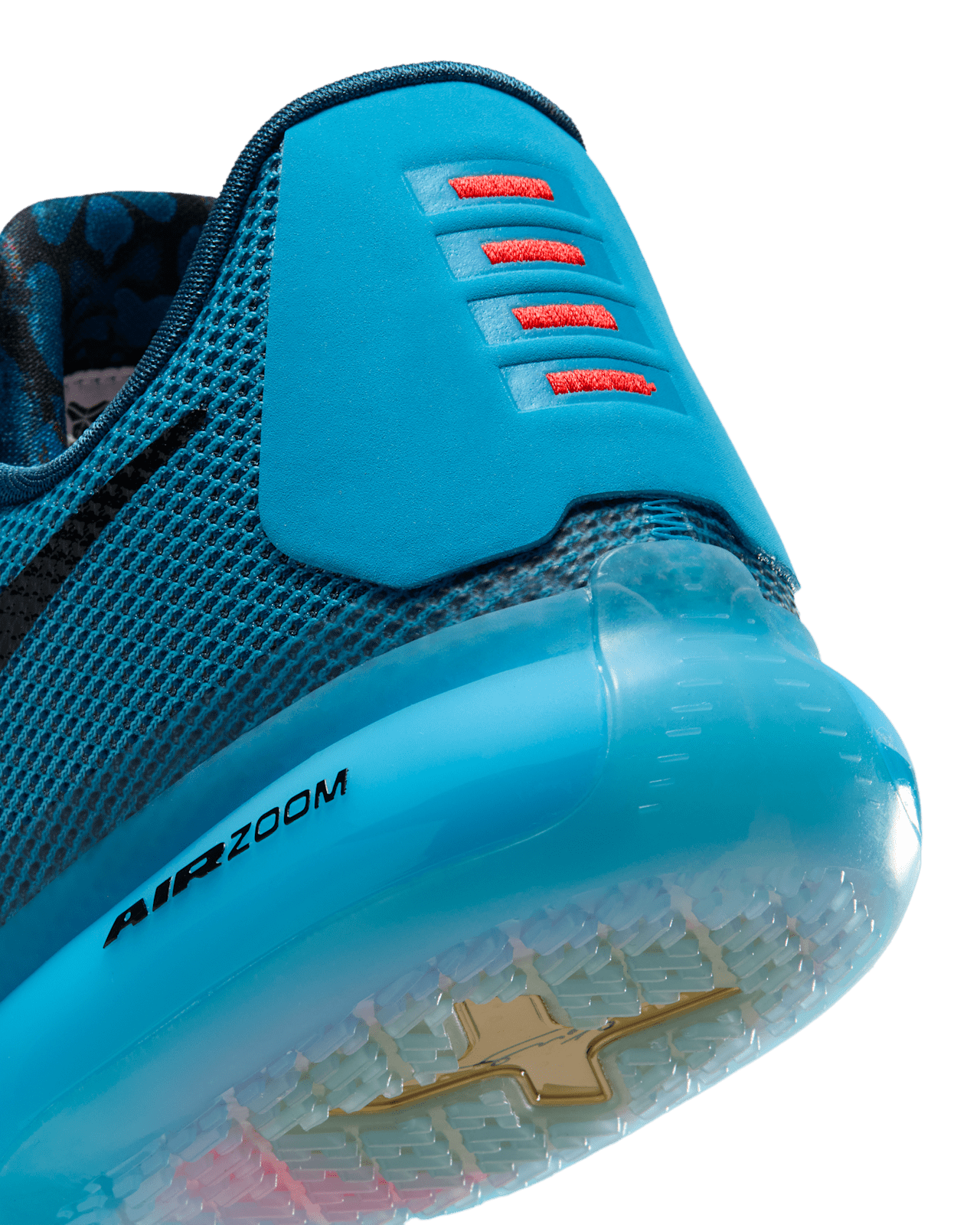 Nike Kobe 10 Protro Blue Lagoon heel and midsole detail showing the orange pull tabs and translucent tooling