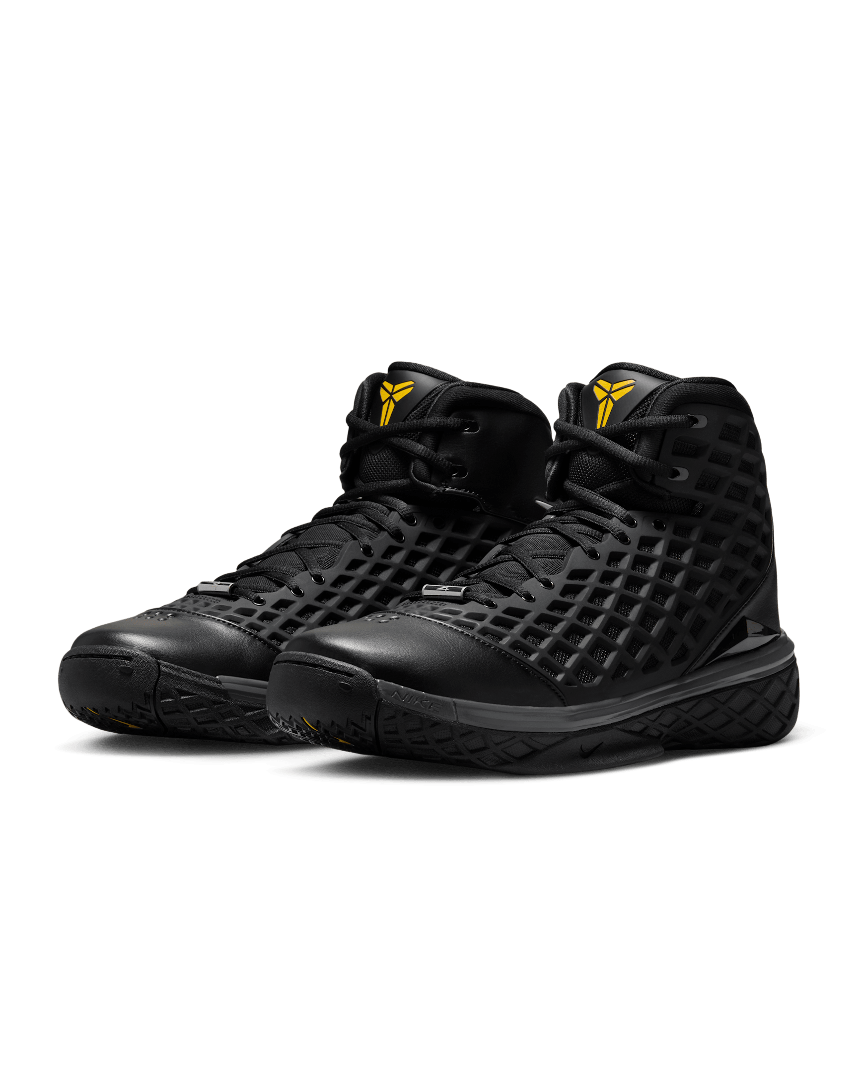 Nike Kobe 3 Protro pair angled view showing the mid top netting cage upper