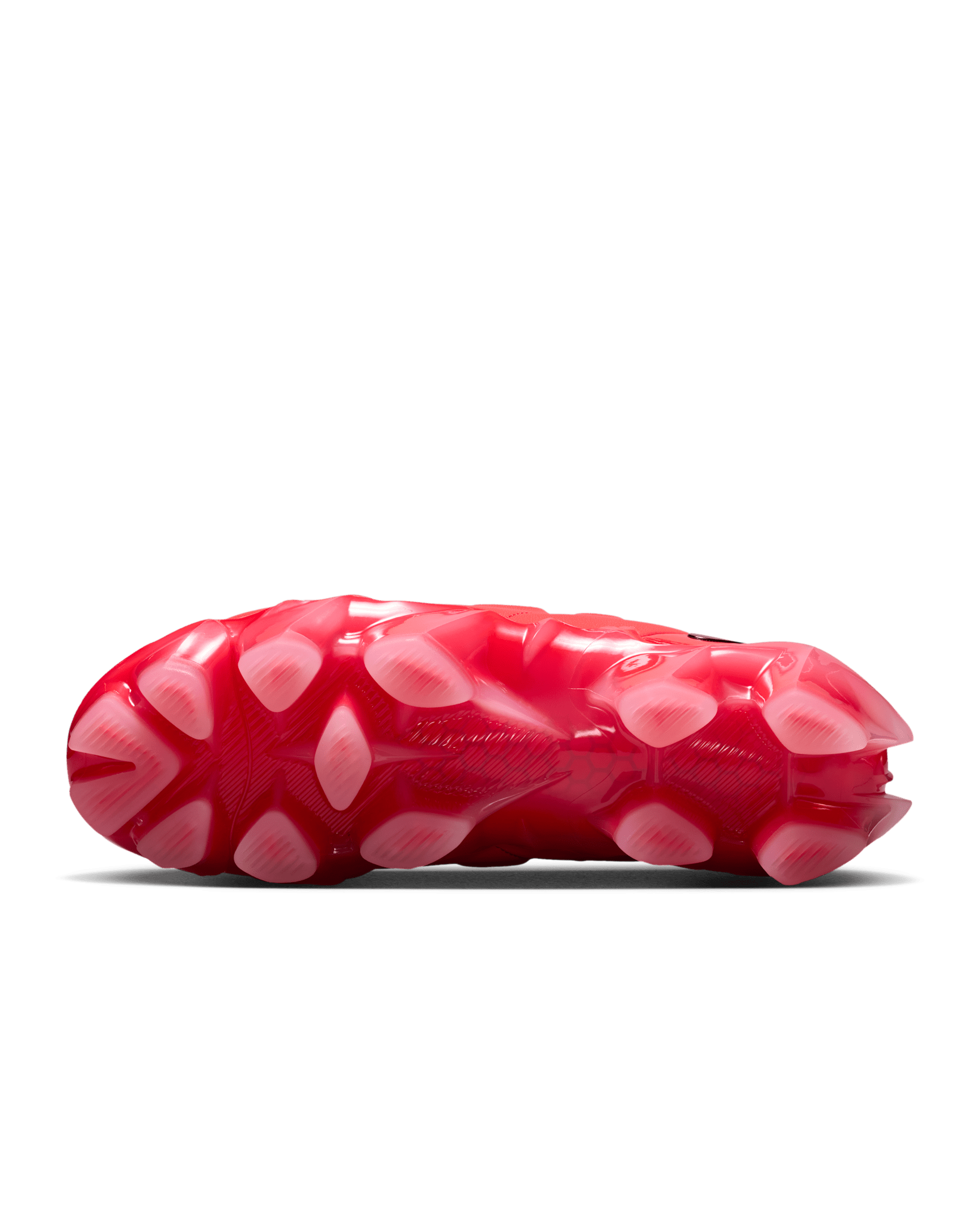 Nike Women's First Sight Mirage clear rubber outsole with rounded studs and Light Crimson tips