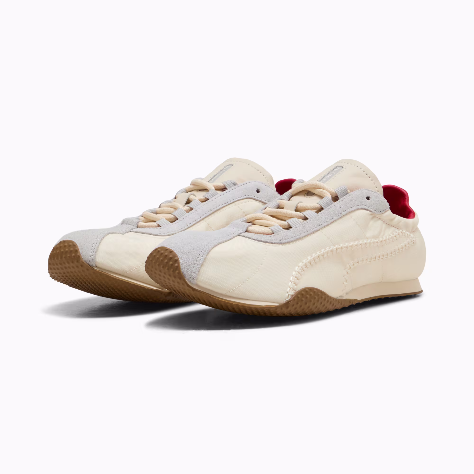 PUMA x Madhappy H-Street pair in Alpine Snow and Cool Light Gray seen from the front, cream nylon uppers with grey suede toe caps over gum outsoles