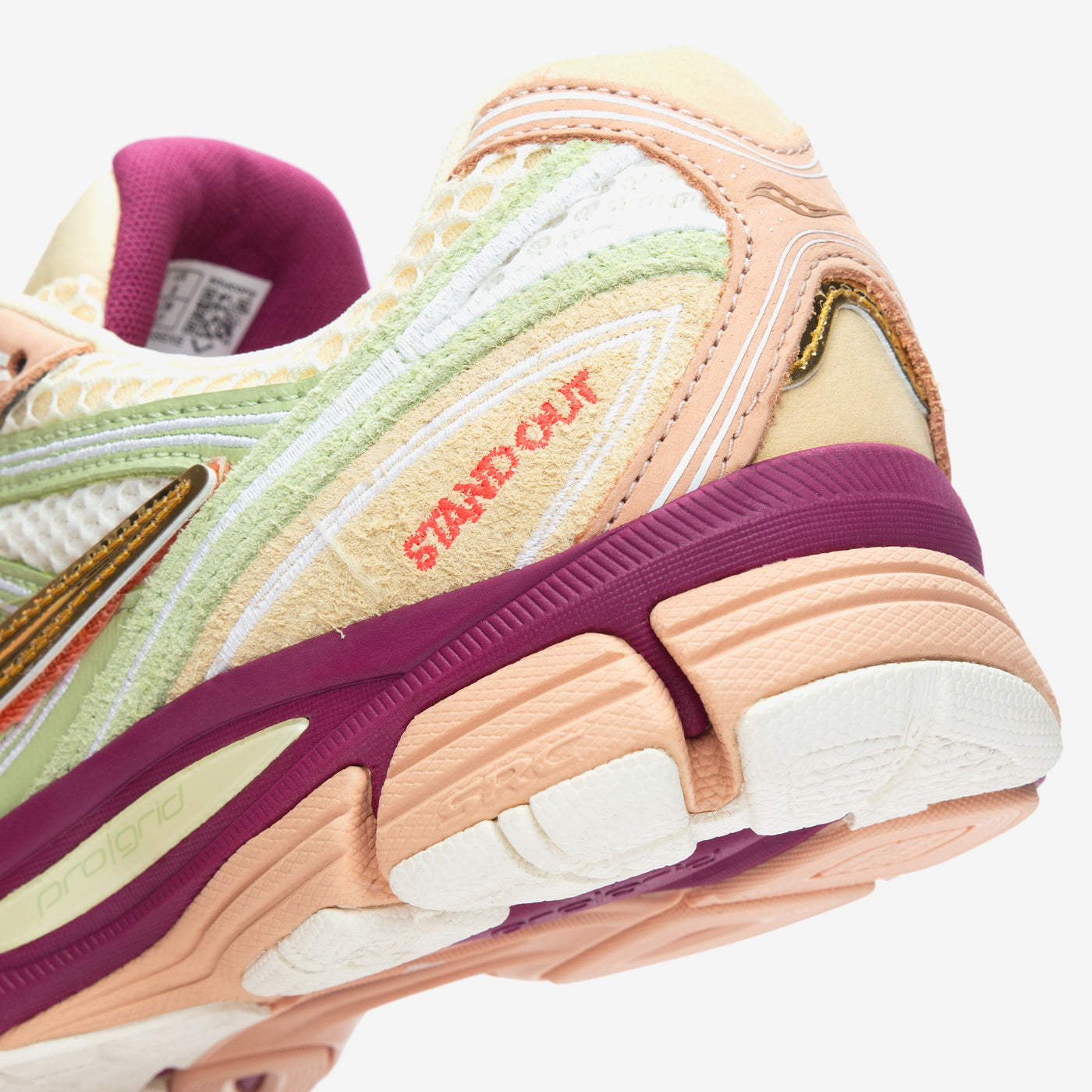 Saucony ProGrid Guide 7 Stand Out detail showing the red STAND OUT embroidery