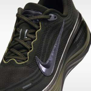 Nike Wraps the Vomero Plus in Chrome and Splits Its Name Across the Two Insoles