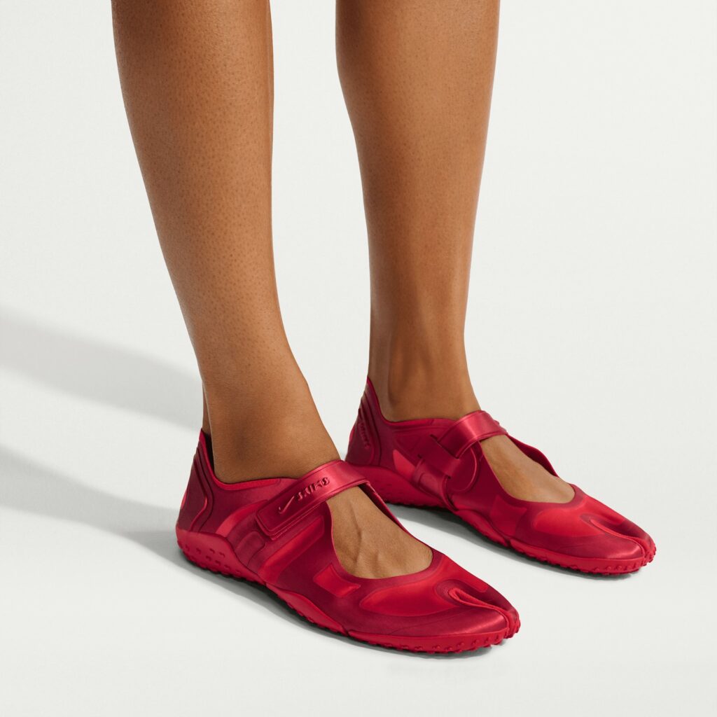 The NikeSKIMS Rift Satin Arrives in University Red, and the Split Toe Came From Kenyan Runners